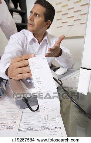 Picture - Businessmen Working in Office. Fotosearch