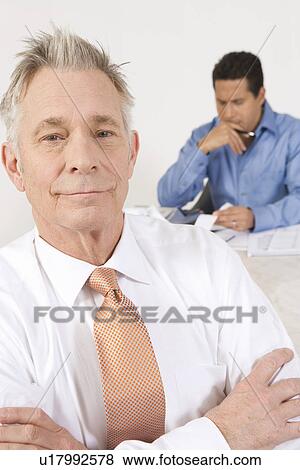 Businessmen Working in Office View Large Photo Image Stock Photo - Businessmen Working in Office. Fotosearch