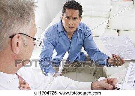 Businessmen Working in Office View Large Photo Image Stock Photograph - Businessmen Working in Office. Fotosearch