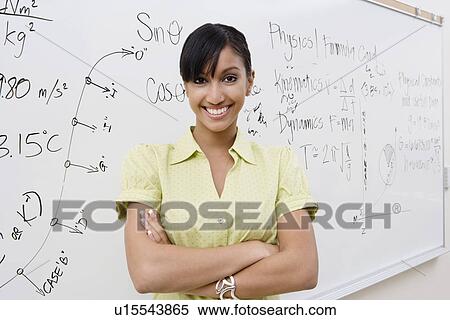 Stock Photography - Businesswoman in Front of Whiteboard. Fotosearch