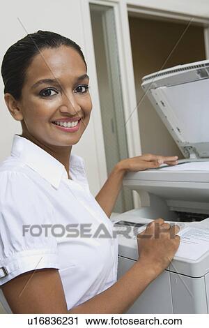 Businesswoman Using Photocopier View Large Photo Image Stock Image - Businesswoman Using Photocopier. Fotosearch