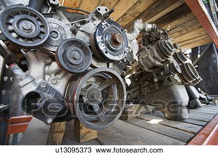 Car engines in junkyard View Large Photo Image Stock Image - Car engines in junkyard. Fotosearch