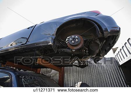 Stock Image - Car in junkyard. Fotosearch