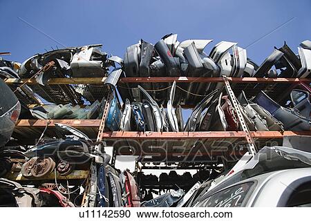 Stock Image - Car parts in Junkyard. Fotosearch
