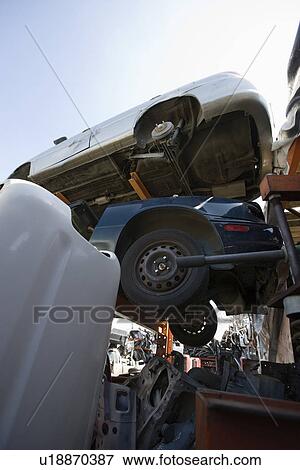Cars in junkyard View Large Photo Image Stock Photo - Cars in junkyard. Fotosearch