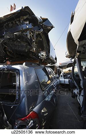 Stock Photograph - Cars in junkyard. Fotosearch