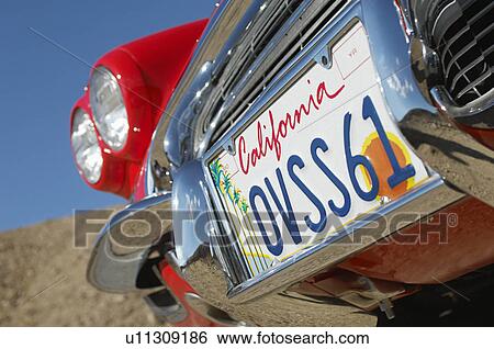 Stock Photograph - Classic cars number plate, close-up. Fotosearch