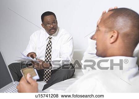 Stock Photo - Client Talking with Accountant. Fotosearch