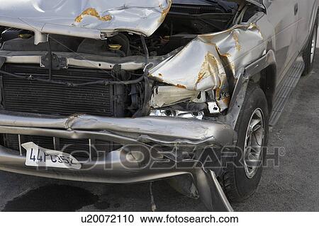 Stock Image - Close-up of damaged car. Fotosearch