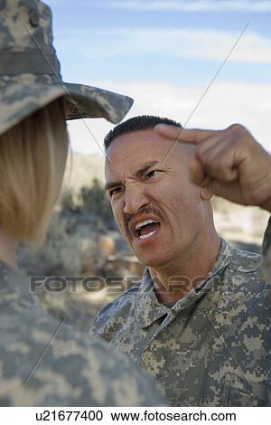 Commander yelling at female soldier View Large Photo Image Stock Image - Commander yelling at female soldier. Fotosearch