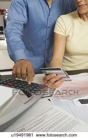 Couple Calculating Bills View Large Photo Image Stock Image - Couple Calculating Bills. Fotosearch