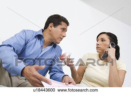 Couple Calling About Credit Card Bill View Large Photo Image Stock Image - Couple Calling About Credit Card Bill. Fotosearch