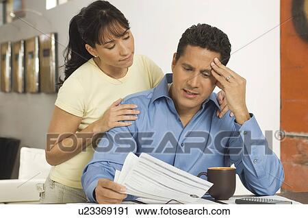 Couple Discussing Finances View Large Photo Image Stock Image - Couple Discussing Finances. Fotosearch