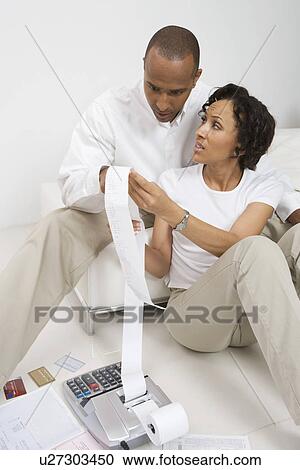 Stock Image - Couple Doing Bills. Fotosearch