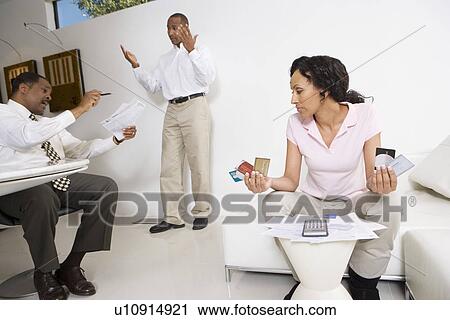 Stock Image - Couple Meeting with Accountant. Fotosearch