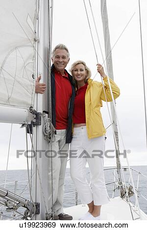 Stock Photo - Couple on yacht, portrait. Fotosearch