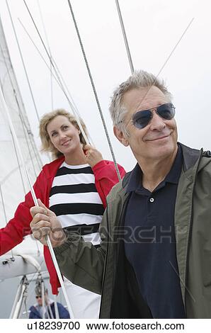 Stock Image - Couple on yacht. Fotosearch