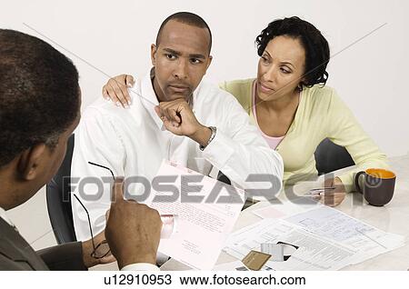 Couple Talking with Accountant View Large Photo Image Stock Image - Couple Talking with Accountant. Fotosearch