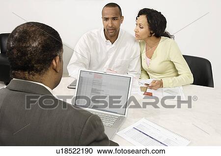 Couple Working with Accountant View Large Photo Image Stock Image - Couple Working with Accountant. Fotosearch
