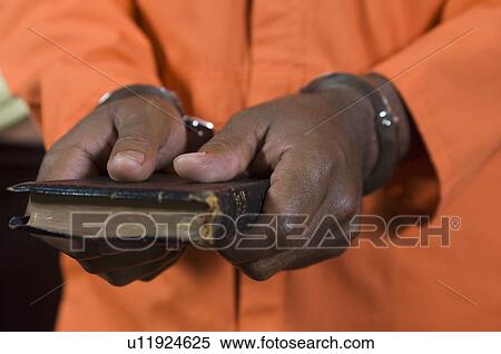Criminal taking oath in court, close-up View Large Photo Image Stock Photography - Criminal taking oath in court, close-up. Fotosearch