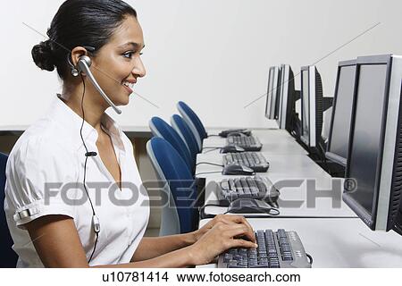 Picture - Customer Service Rep in Call Center. Fotosearch