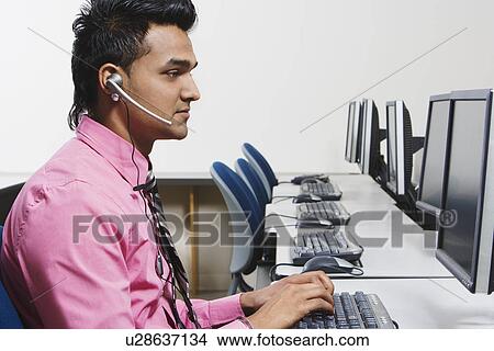 Picture - Customer Service Rep in Call Center. Fotosearch