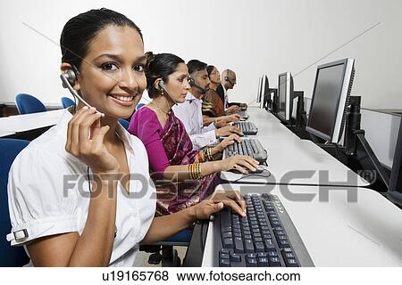Customer Service Reps in Call Center View Large Photo Image Stock Photo - Customer Service Reps in Call Center. Fotosearch