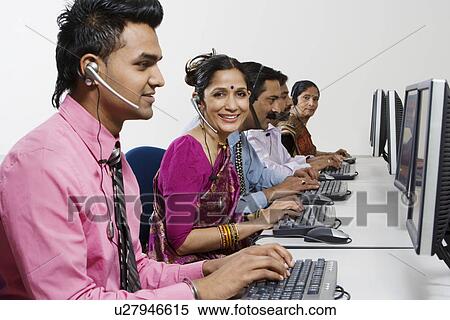 Stock Photography - Customer Service Reps in Call Center. Fotosearch