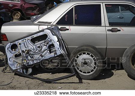 Stock Photo - Damaged car and parts. Fotosearch