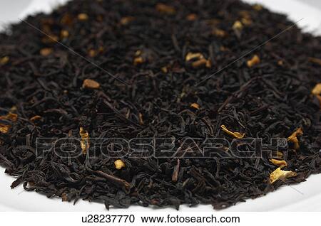 Dried tea leaves on plate, close-up View Large Photo Image Stock Image - Dried tea leaves on plate, close-up. Fotosearch