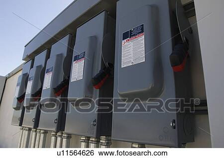Stock Photograph - Electrical Breaker Boxes at Solar Power Plant. Fotosearch