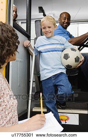 Stock Image - Elementary Student Arriving at School. Fotosearch