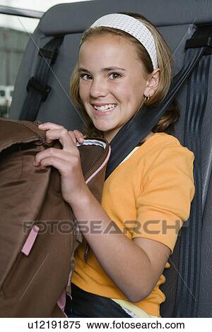 Stock Photography - Elementary Student on School Bus. Fotosearch