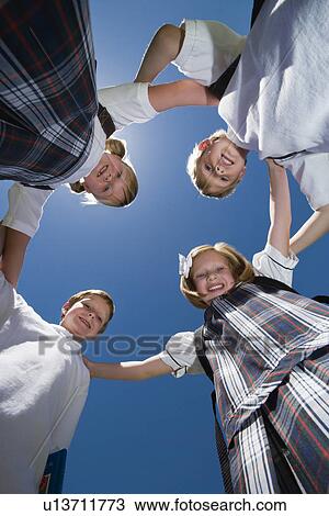 Stock Image - Elementary Students in Circle. Fotosearch