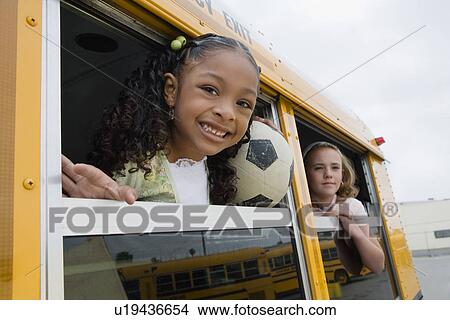 Picture - Elementary Students on School Bus. Fotosearch