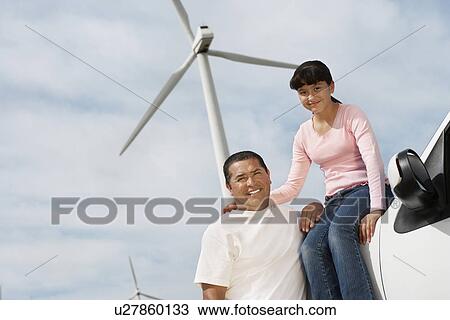 Father and daughter (7-9) at wind farm, portrait View Large Photo Image Stock Image - Father and daughter (7-9) at wind farm, portrait. Fotosearch