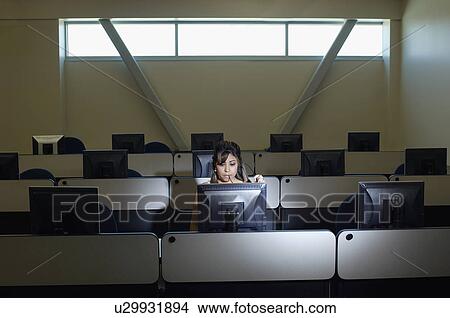 Female student working in computer classroom View Large Photo Image Picture - Female student working in computer classroom. Fotosearch