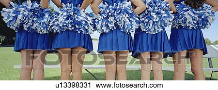 Five cheerleaders in row, back view, mid section View Large Photo Image Stock Image - Five cheerleaders in row, back view, mid section. Fotosearch