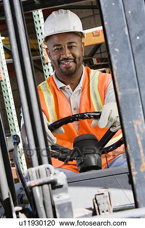 Stock Image - Forklift Driver. Fotosearch