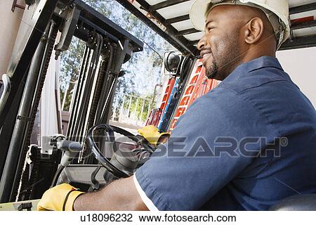 Stock Image - Forklift Operator. Fotosearch