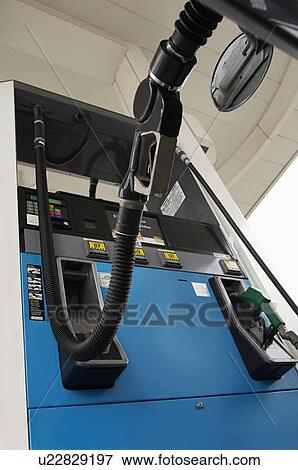 Stock Photo - Fuel pump in car. Fotosearch