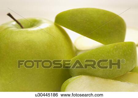 Granny smith apple with peel View Large Photo Image Stock Photograph - Granny smith apple with peel. Fotosearch