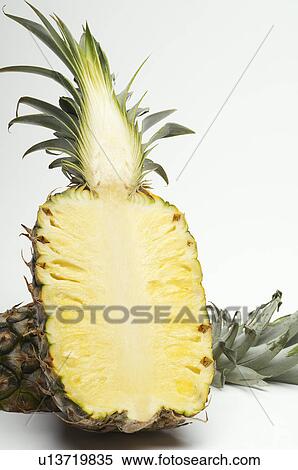 Halved pineapple View Large Photo Image Stock Photography - Halved pineapple. Fotosearch