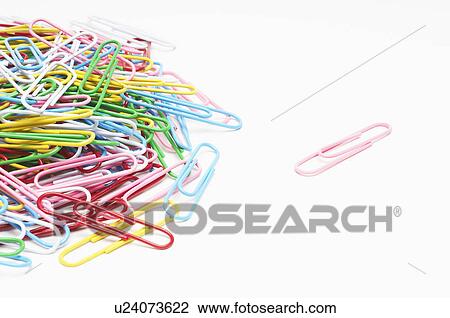 Stock Image - Heap of multi colored paper clips. Fotosearch