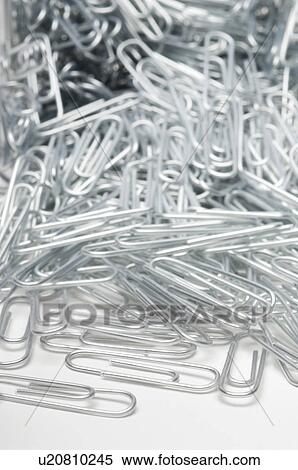 Heap of paper clips, close-up View Large Photo Image Stock Photography - Heap of paper clips, close-up. Fotosearch
