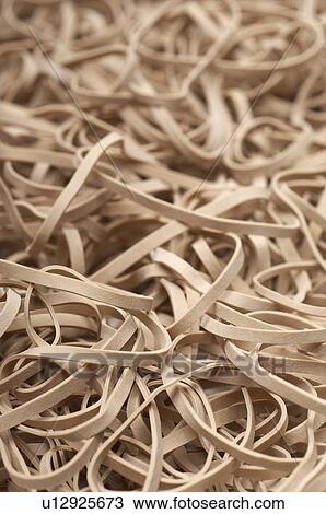 Heap of white rubber bands View Large Photo Image Stock Image - Heap of white rubber bands. Fotosearch