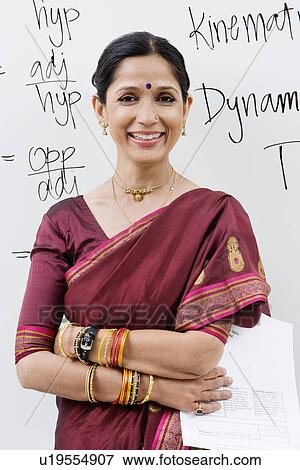 Stock Photo - Indian Businesswoman in Front of Whiteboard. Fotosearch