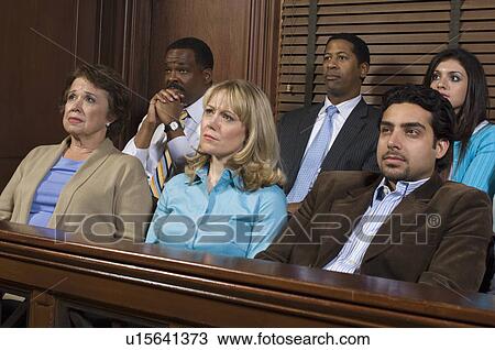 Stock Image - Jurors in courtroom during trial. Fotosearch