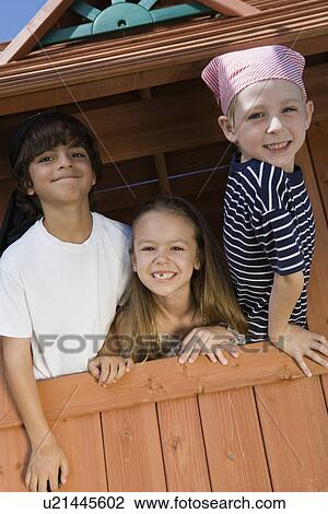 Stock Image - Kids Playing in a Fort. Fotosearch