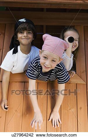 Kids Playing in Playhouse View Large Photo Image Stock Image - Kids Playing in Playhouse. Fotosearch